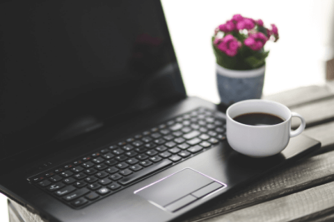 laptop and espresso cup