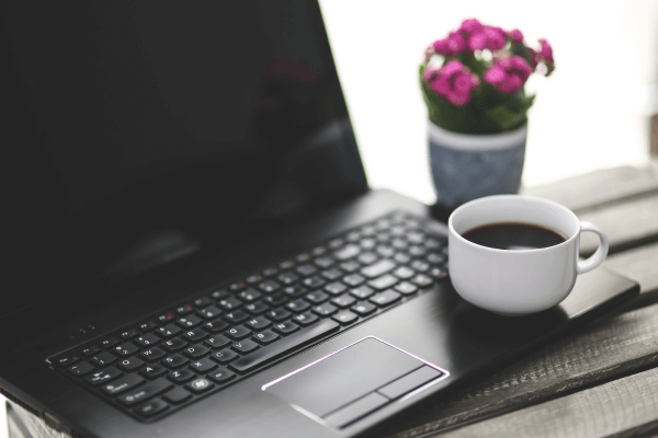 laptop and espresso cup